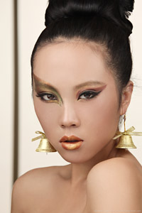 Portrait of Asian model Amelia with christmas makeup by Nizi